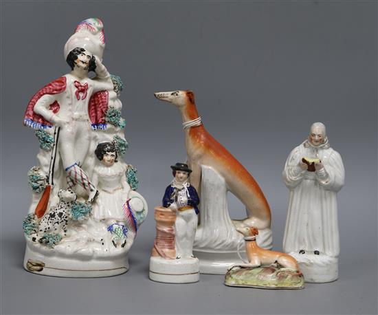 A Staffordshire figure of John Wesley and four other Staffordshire figures, Tallest 28cm
